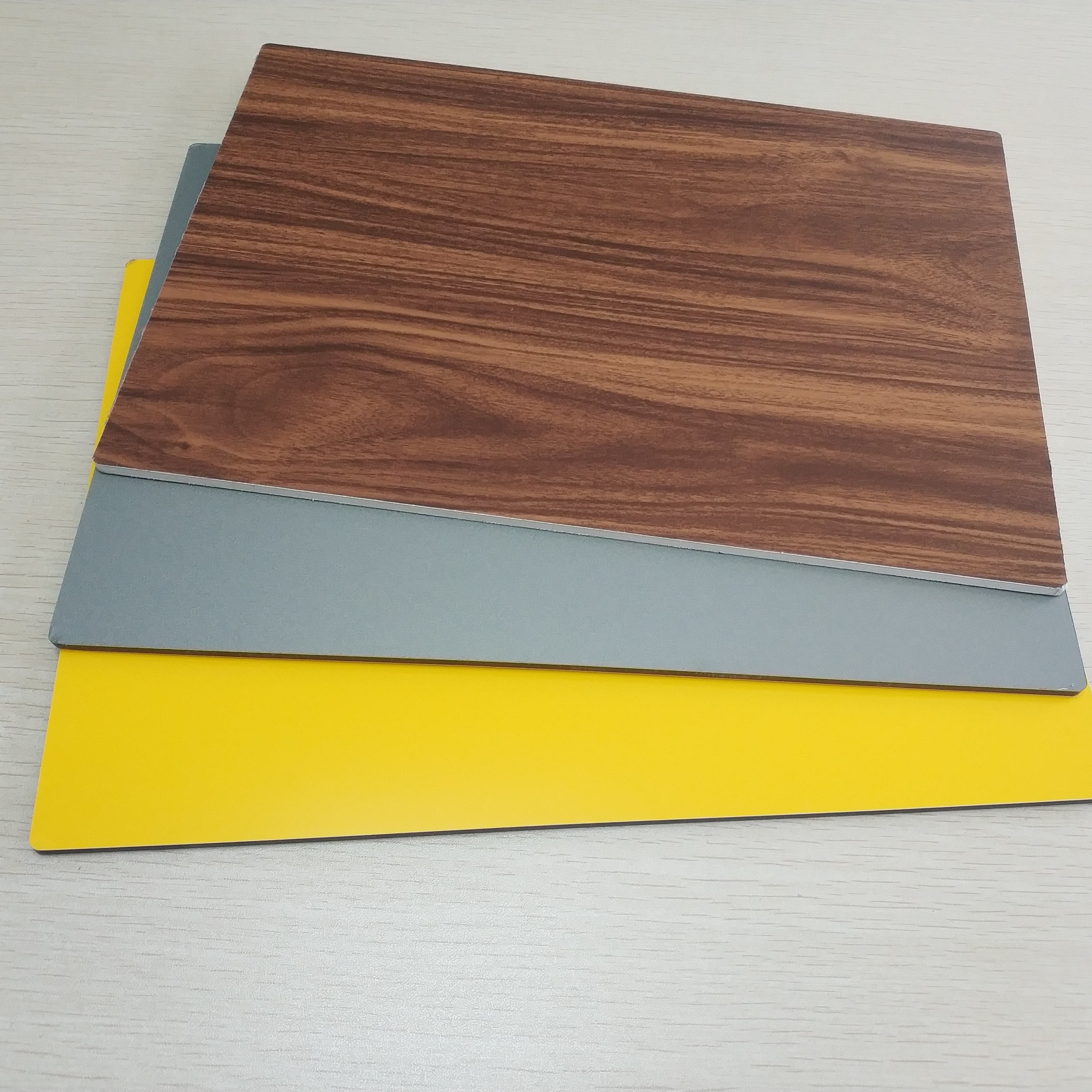Quality Circular Cladding Wood Grain Aluminum Composite Panel Embossed Surface Density 2.5% for sale