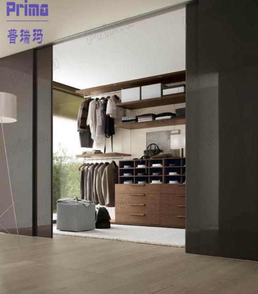high-black-sliding-doors-with-white-standing-lamp-plus-wooden-walk-in-wardrobe-organization
