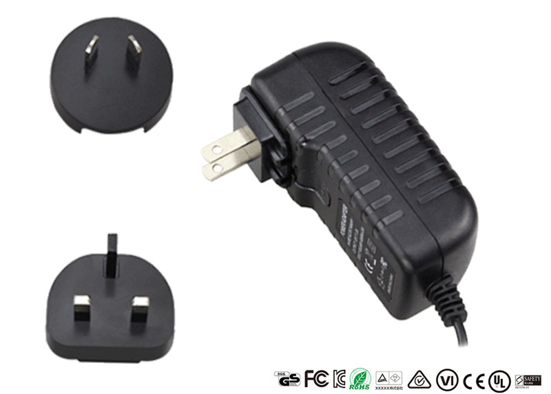 Quality 15W Interchangeable Plugs Universal Travel Adapter 15V 1A Switching Adapters for sale