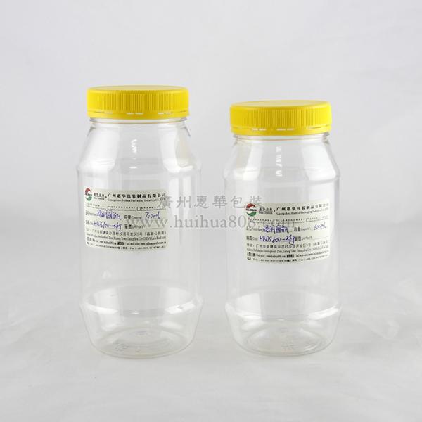 Buy 600ml Clear Plastic Cylinder Tubes , Yellow PP Material Screw Lid at wholesale prices
