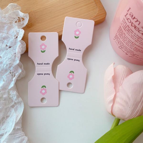 Buy Pink Floral Hair Tie Display Cards 100pcs 9x3.5cm at wholesale prices