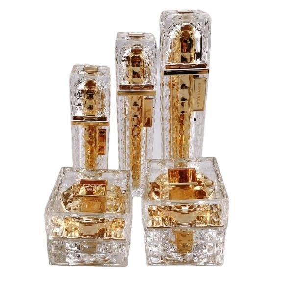 Buy Pull-Ring Sealing Type Golden Yellow Acrylic Bottles with Press Pump 30ml 50ml 100ml at wholesale prices