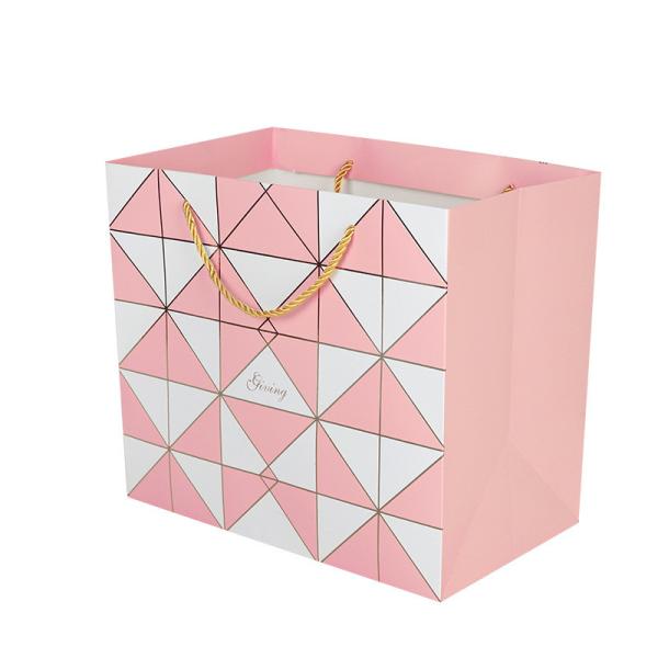 Buy OEM men's business suit gift paper packaging white paper bag with handle at wholesale prices