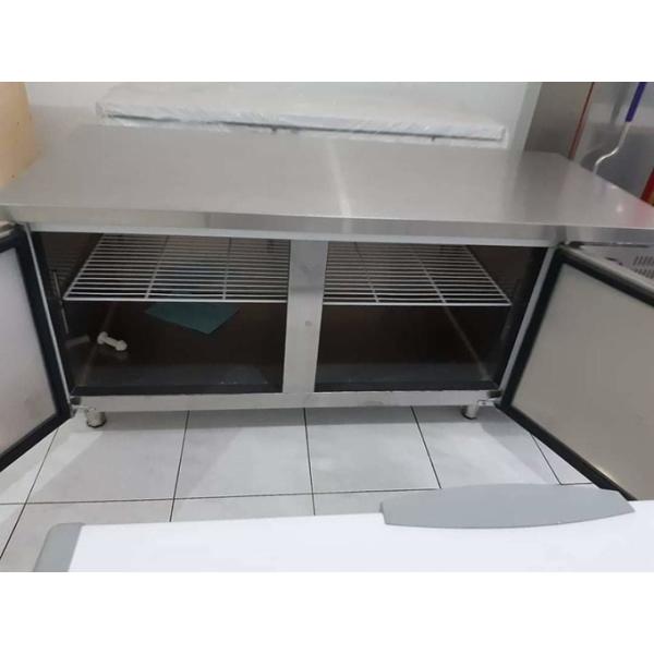 Stainless steel commercial refrigerator workbench in the back kitchen of hotel restaurant 8