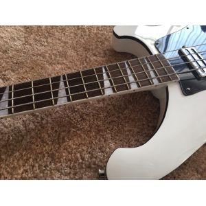 4 string bass guitar set in neckshark inlay on rosewood black ABS binding set in