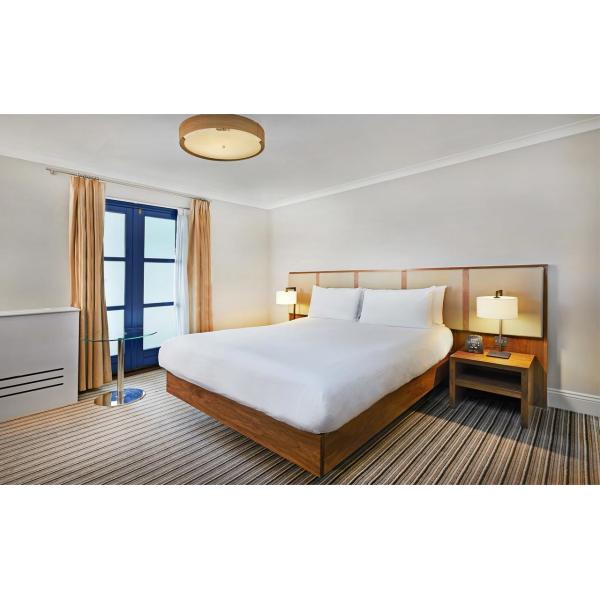 Buy Budget Hotel Bedroom Furniture Leather bed with Leisure chairs and Wood TV Stand Cabinets at wholesale prices