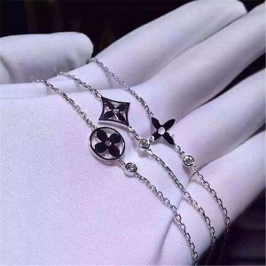   diamonds of logo bracelet 18kt  gold  with white gold