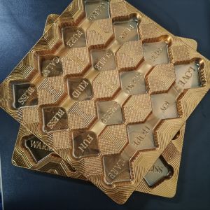 China Customized disposable gold 16 compartment PET chocolate container with logo on sale