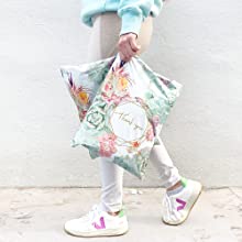 Girl walking holding thank you poly mailer 