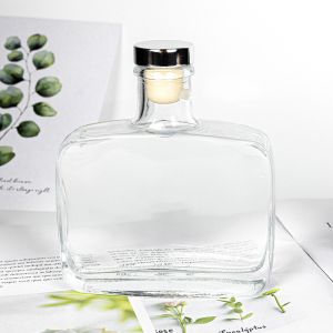 China Transparent 300ml 500ml Empty Glass Wine Bottles Embossing Electroplating on sale