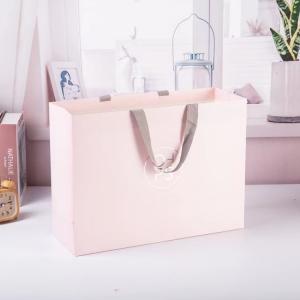 China 28.5*8*40cm Pink Paper Bags Custom Logo on sale