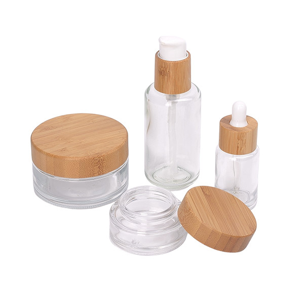 Buy Wooden Packaging Wood Soap Dispenser Glass Lotion Bottle Cosmetic Bottles Spray And 30g 50g Bamboo Glass Jar at wholesale prices