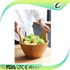 wooden bamboo salad bowls with serving hands and serving bowls