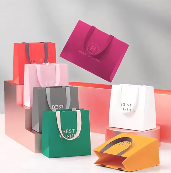 Buy Luxury Christmas Gift Packaging Tyvek Craft Paper Bags With Customers Logo at wholesale prices