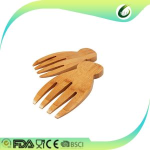 wooden bamboo salad bowls with serving hands and serving bowls