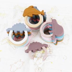 China Cartoon Silicone Baby Teether Toy With Penguin Unicorn Raccoon Shape on sale
