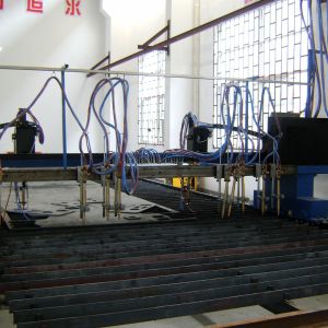 Red 9 + 2 CNC Flame Plasma CNC Cutting Machine Gantry Type 15m Rail 120m/Min