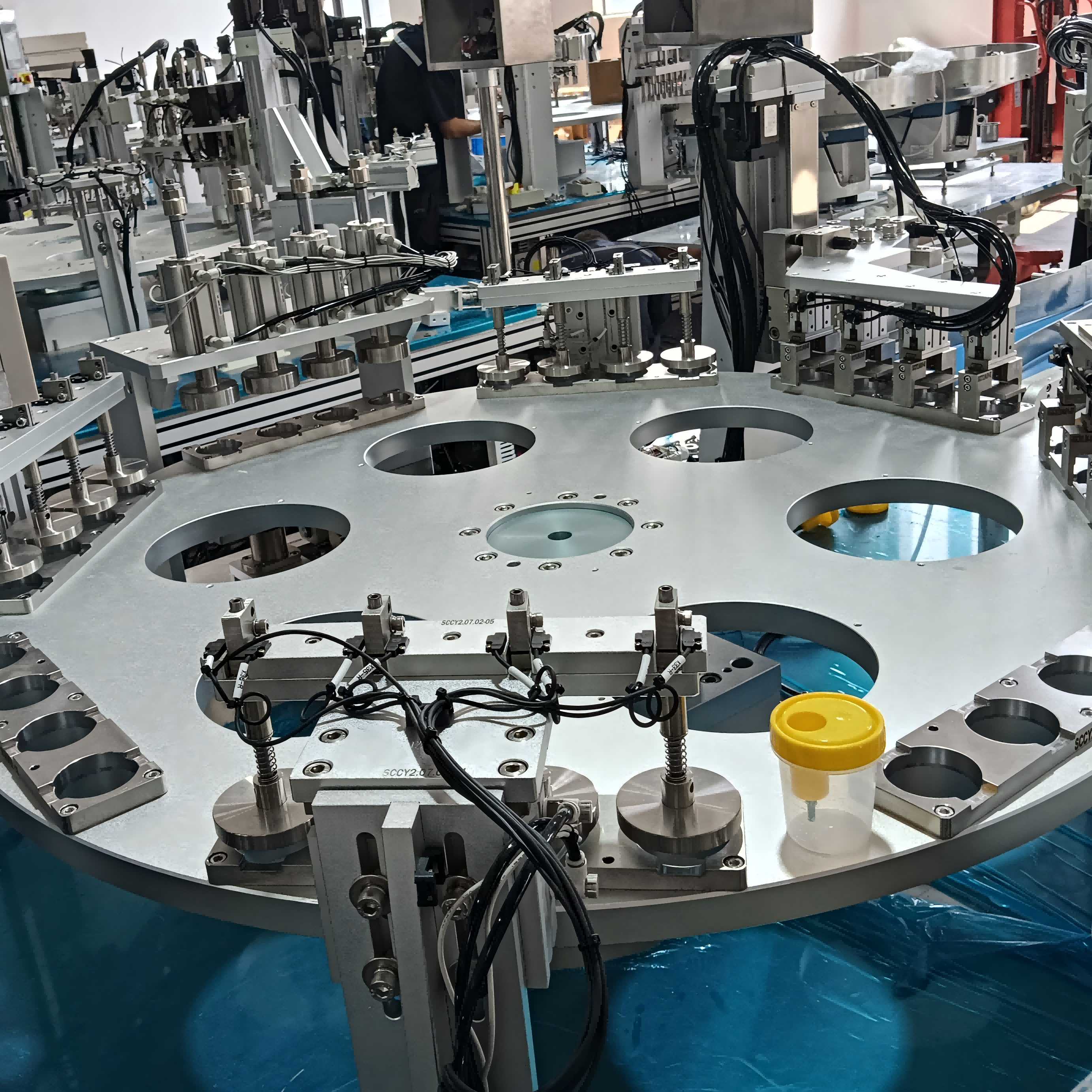 Automated Urine Cup Assembly Machine Customisable, highly flexible, and adaptable