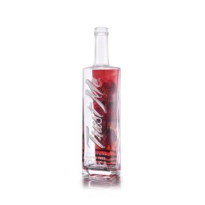 Quality Embossed Lettering Luxury Spirits Bottle 900g 750ml Clear Glass Bottles for sale