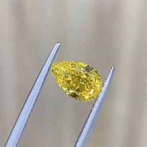 0.53 Carat Pear Shaped VVS2 Lab Created Yellow Diamond Without Setting