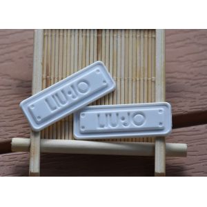 China Degradable 2mm garment TPU Clothing Labels With Mould Embossed Logo on sale