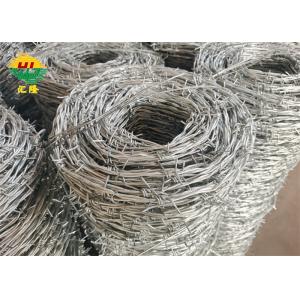 Hot Dipped 12 Gauge Galvanized Iron Barbed Wire On Fence Top