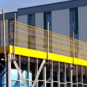 Free-Standing Edge Protection Barrier With Self-Supporting Base