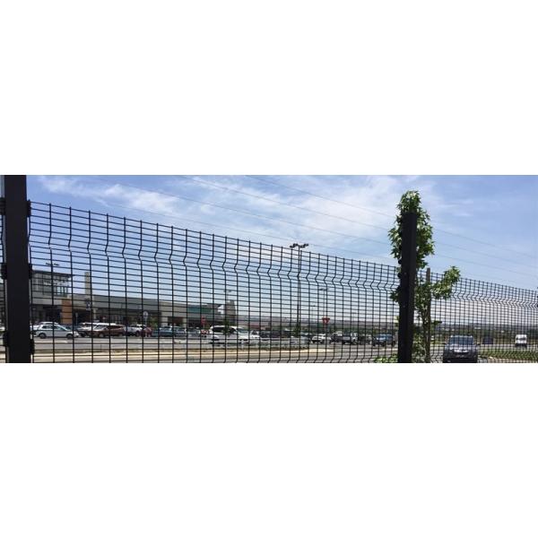 Black polyester coated Medium Security clearvu fence for parking lot protection.