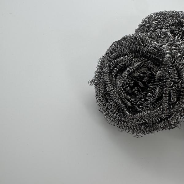 Stainless steel cleaning ball in use