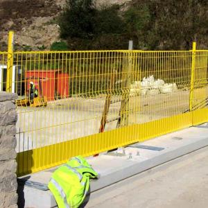 Low-Profile Edge Protection Barrier With Minimal Obstruction Design