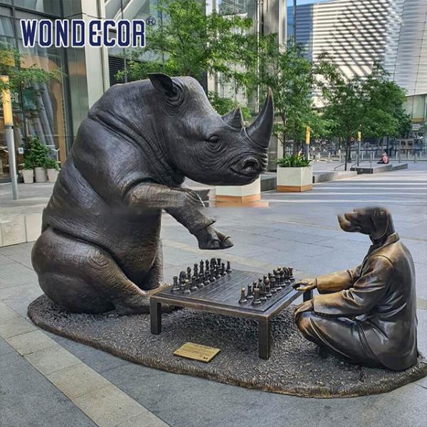 Buy Smooth Bronze Sculpture Art Rhinoceros And Dog Playing Chess Together at wholesale prices