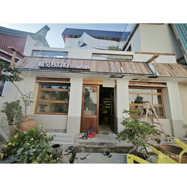 Water-Reflective Folding Window Design Amplifying Natural Light Through Strategic Shoreline Positioning