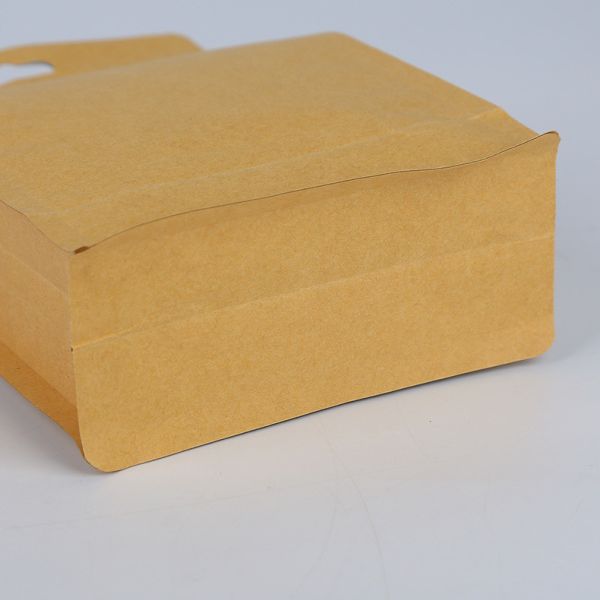 China Stock Quad Seal Brown Flat Bottom Stand Up Doypack Kraft Paper Food Zipper Pouch Bag