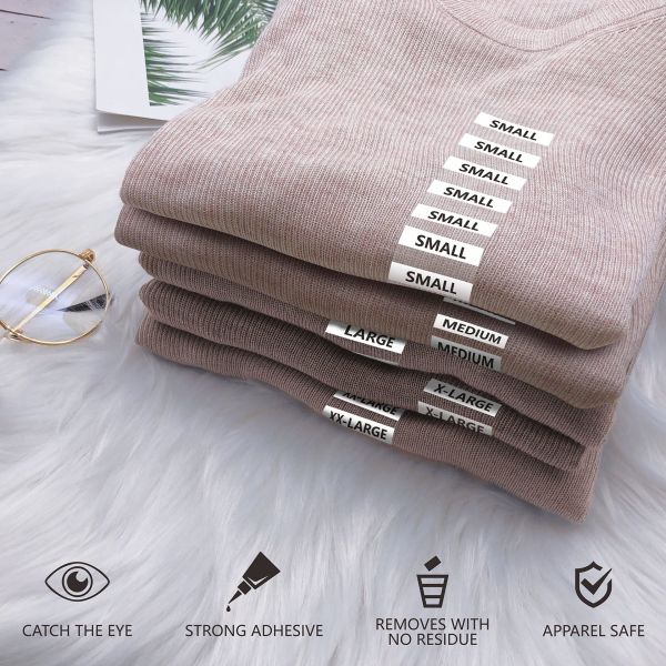 Transparent clothing size strip label tear resistant 250 strips per roll, 3.18 cm X 12.70 cm