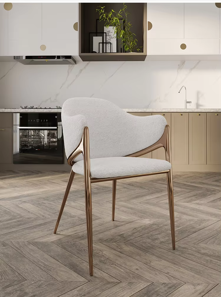 Set of gold and white dining chairs in restaurant setting