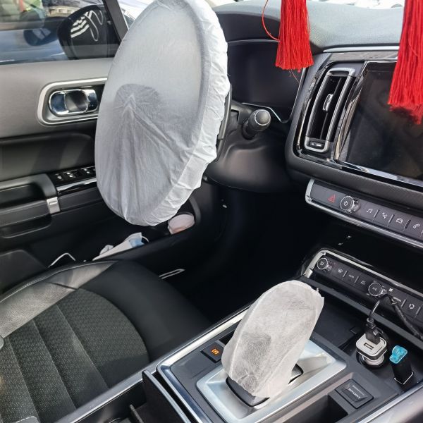 Buy Plastic Non Woven Car Disposable Steering Wheel Covers 0.02mm at wholesale prices