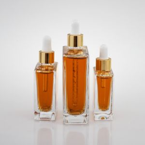 Transparent Custom Logo Bottle 30ml 50ml 100ml With Gold Dropper