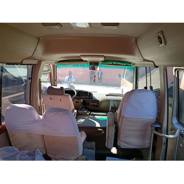30 Seater Toyota Coaster Bus Japanese Mini Bus Open The Door Outside