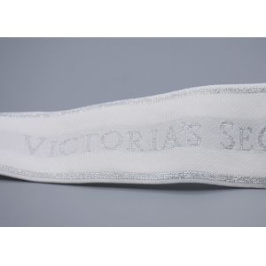China Clothing Customized 35mm White Jacquard Elastic Tape With Shiny Silver Logo on sale