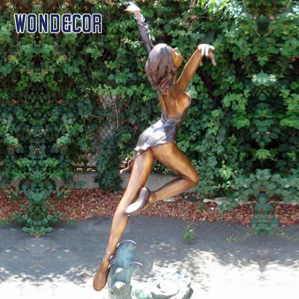 Outdoor garden decoration, a bronze statue of a beautiful woman dancing at the size of a real person