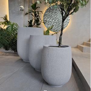 Create a Beautiful Garden with Fiberglass Flower Pots Durable and Lightweight