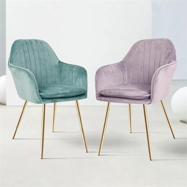 Set of velvet dining chairs in modern interior