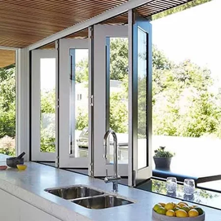 Alpine View Folding Window Configuration Framing Dramatic Elevation Changes and Cloud Formations