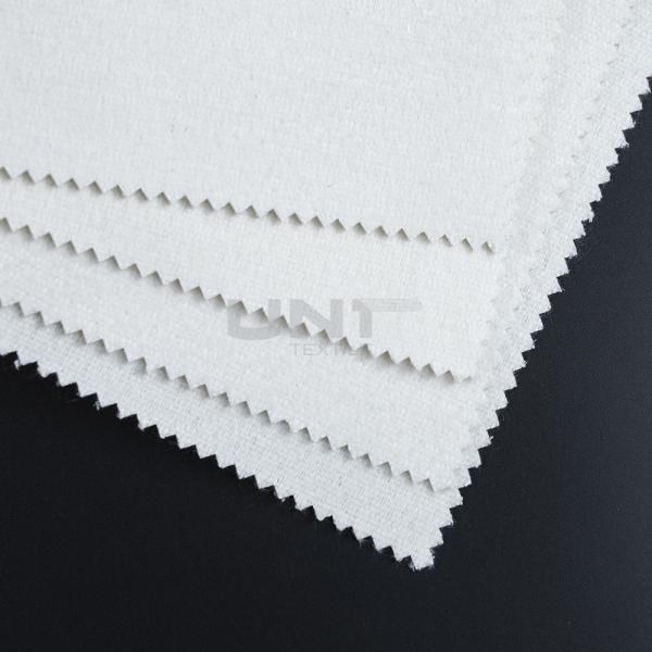 Buy Structured and Smooth Finish Tie Interlining Fabric for a Professional and Polished Appearance at wholesale prices