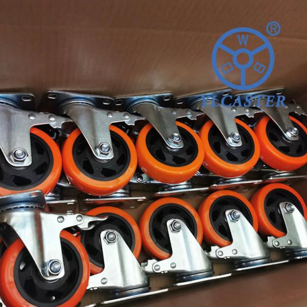 Buy 4 Inch Hollow Core Polyurethane Wheels Orange Black Wheel Swivel Locking Casters at wholesale prices