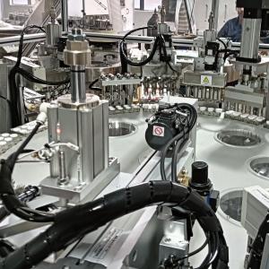 Quality Customised Indexed Motion Heli Cap Assembly Machine With Easy To Use Touch Screen Operation for sale