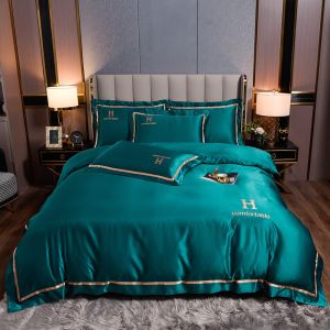 Customized Logo Winter Embroidered Polyester Washed Silky Bedding Set for Solid Color