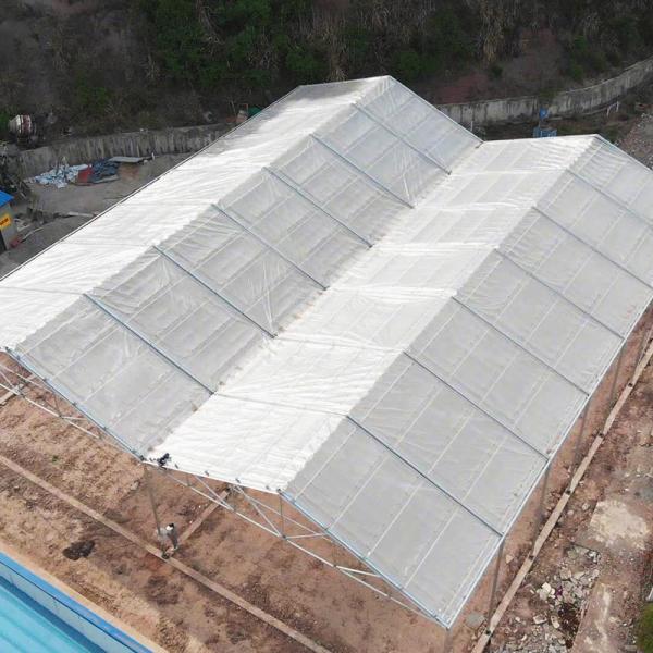 Buy Galvanized Steel Plastic Film Greenhouse Retractable Large Tunnel Custom at wholesale prices