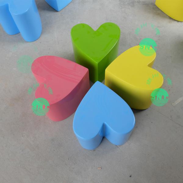 Hotel mall deco heart shape multi-color fiberglass chair statue as functional furniture
