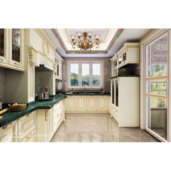 Opulent and Refined Custom Stainless Steel Kitchen Cabinetry with Deep Green Marble Countertop and Soft-Close Doors